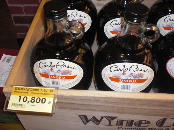 Mom, LOOK! They have mini jugs of Carlo Rossi Sangria!