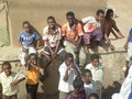 Children posing for photos in Karima
