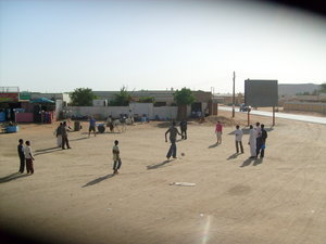 Playing football with locals in Sudanese village
