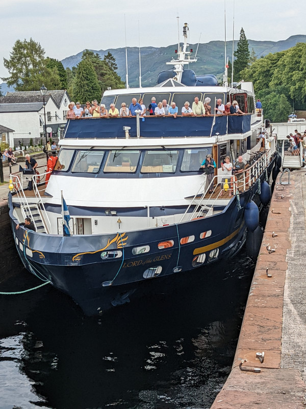 Large passenger vessel coming up the locks from Loch Ness