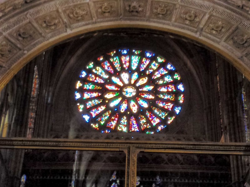 A view of Rose Window above frame of choir.