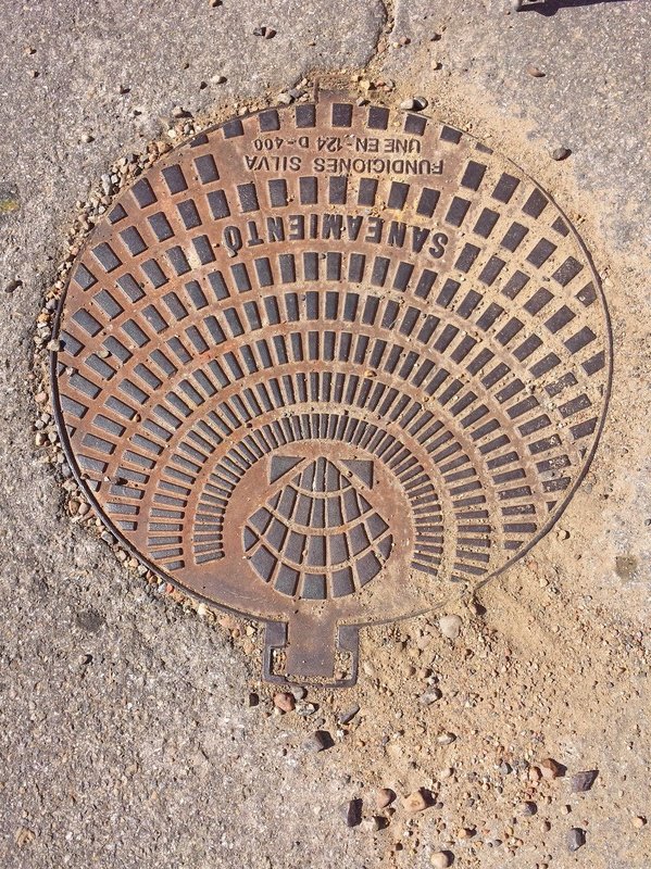 The scallop shell manhole cover
