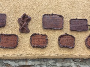 Some of the wall of plaques in old town Villafranca