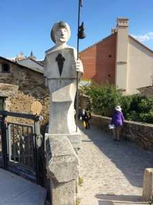 Pilgrim statue at the bridge going out of Villafranca