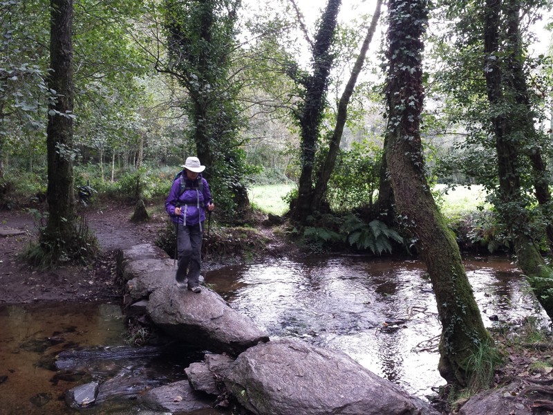 Karen at this stream crossing on stones