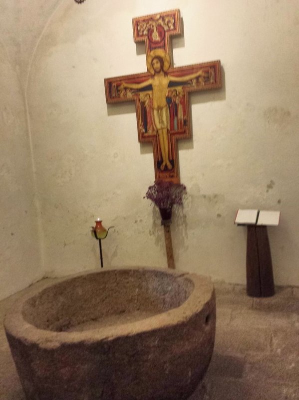 The baptistry in the church located in a side room