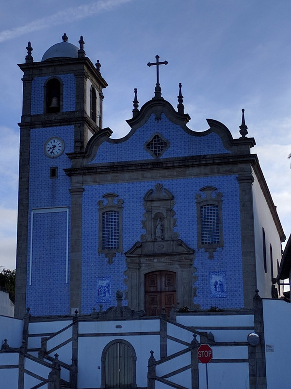 Arrifana church with blue titles covering it.