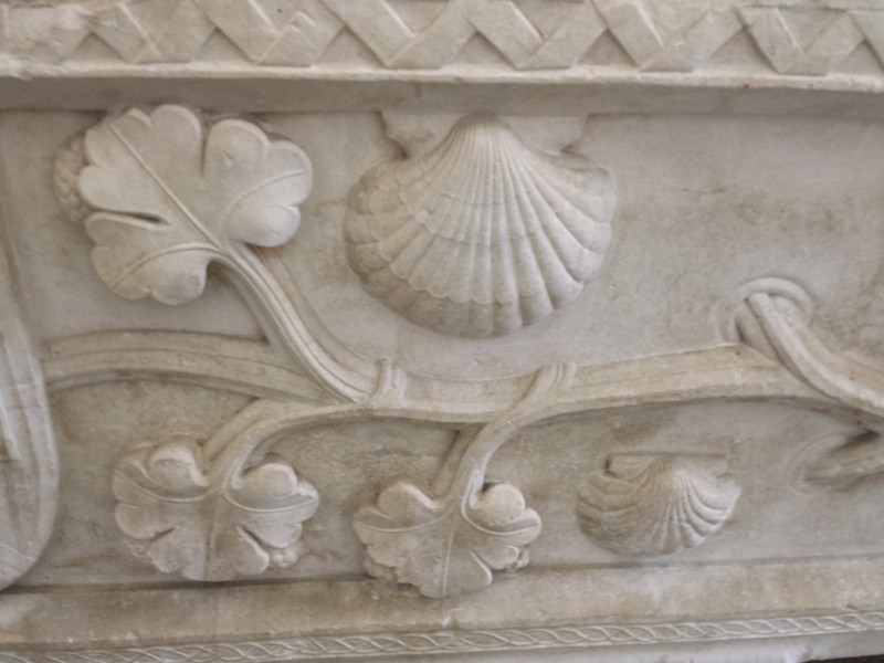 Shell and vine motif on wall