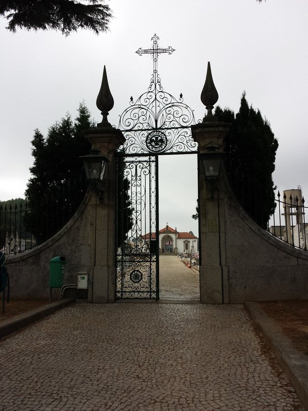 Cemetery gates across street from monastery 