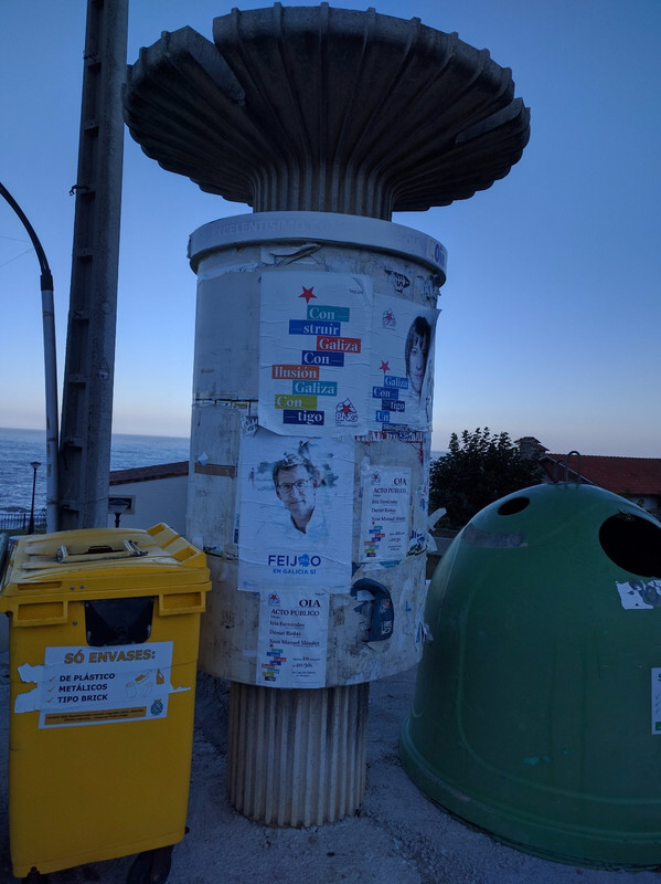 A shape near the recycle bins