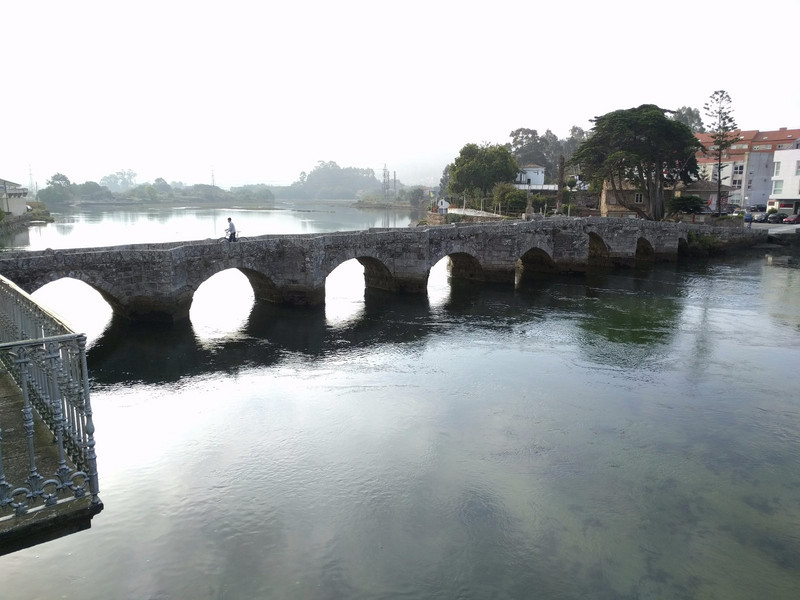 The old Roman bridge across the river Vigo as it comes into the bay.