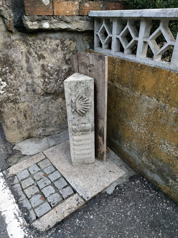 Unique stone pillar Camino waymark