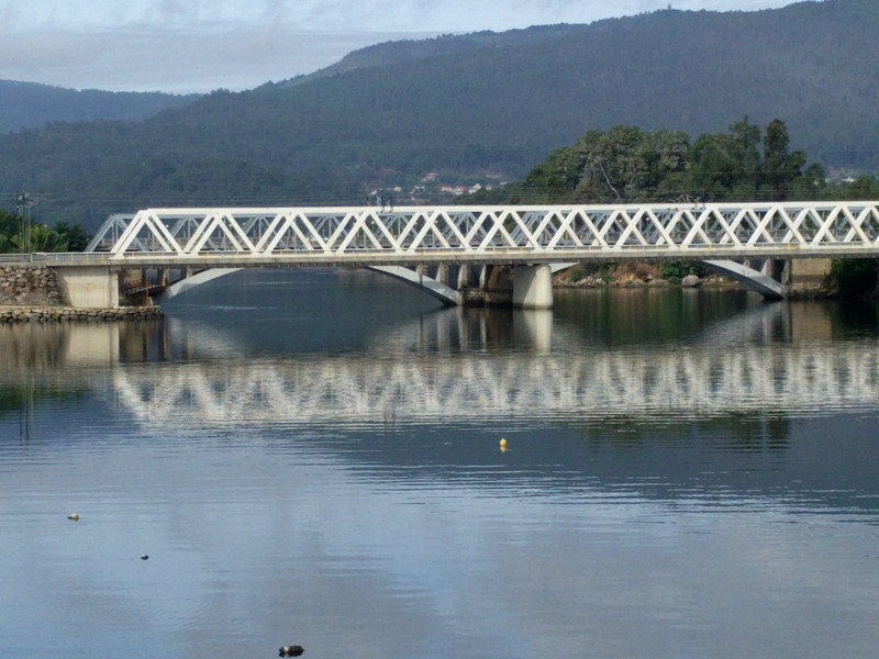 Railroad bridge and reflection