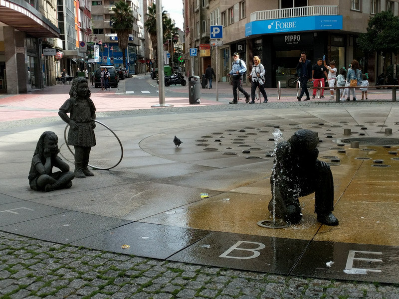 Fountain statues play in the water in Pontevedra