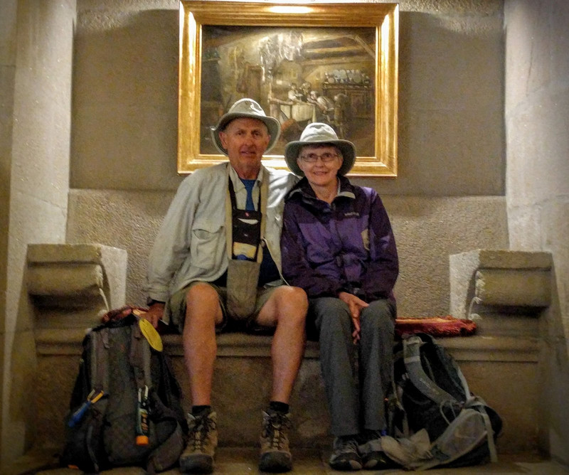 We use a bench near the parador stairs for a Camino photo