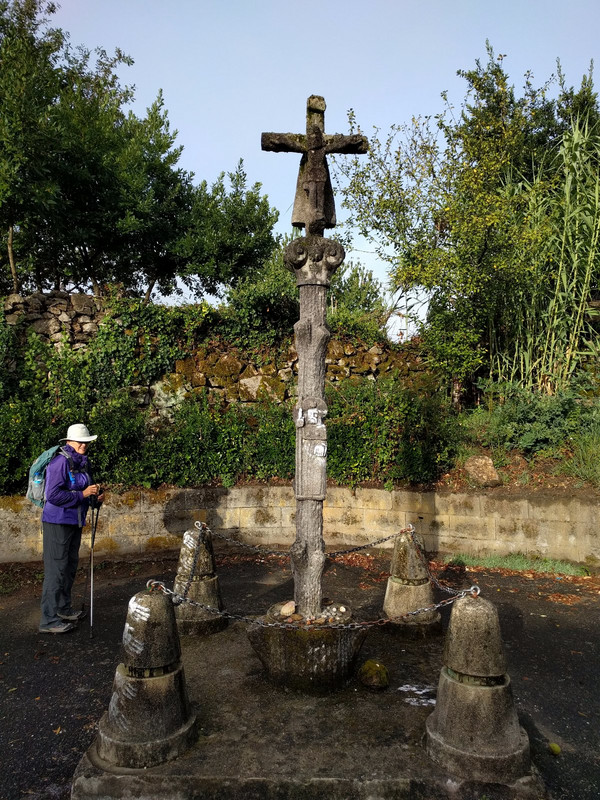 And art work and memorials surround this wayside cross