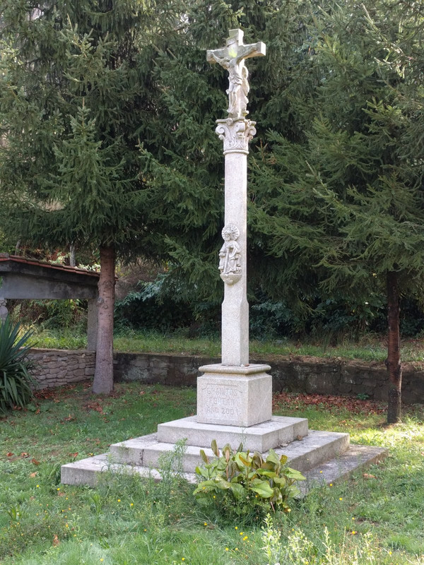 A modern wayside cross very close to the next ancient one.
