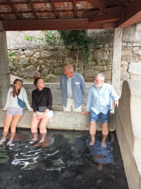 Julian tries this pool while Harlan talks to two young women pilgrims