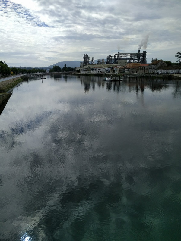 The river Sar with power plant in distance