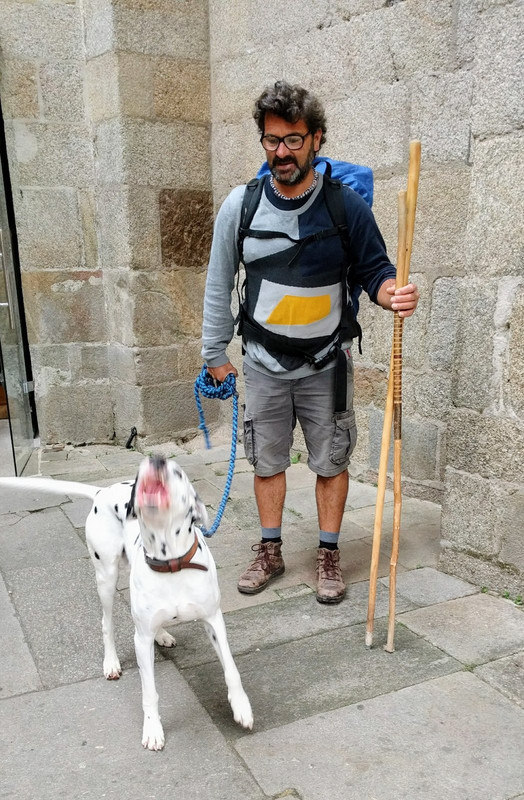 A pilgrim and his dalmatian have made the journey