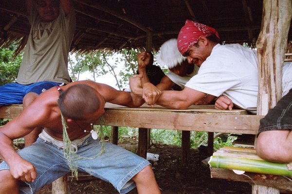 Arm wrestling during a drinking binge, Yap