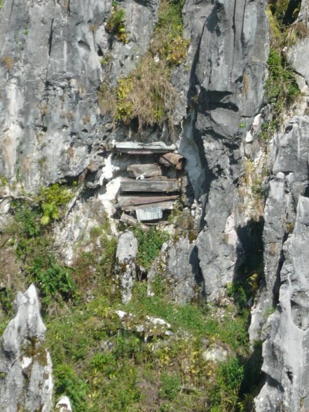 Hanging coffins high on a cliff face