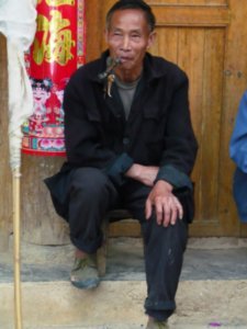 Old man in mountain village near Zhaoxing