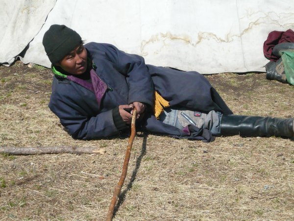 Dukha man outside tent