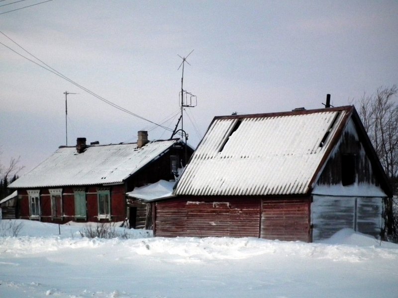 These two houses made up an entire "station" that the train stopped at in the Far North, although there was no platform or any other buildings