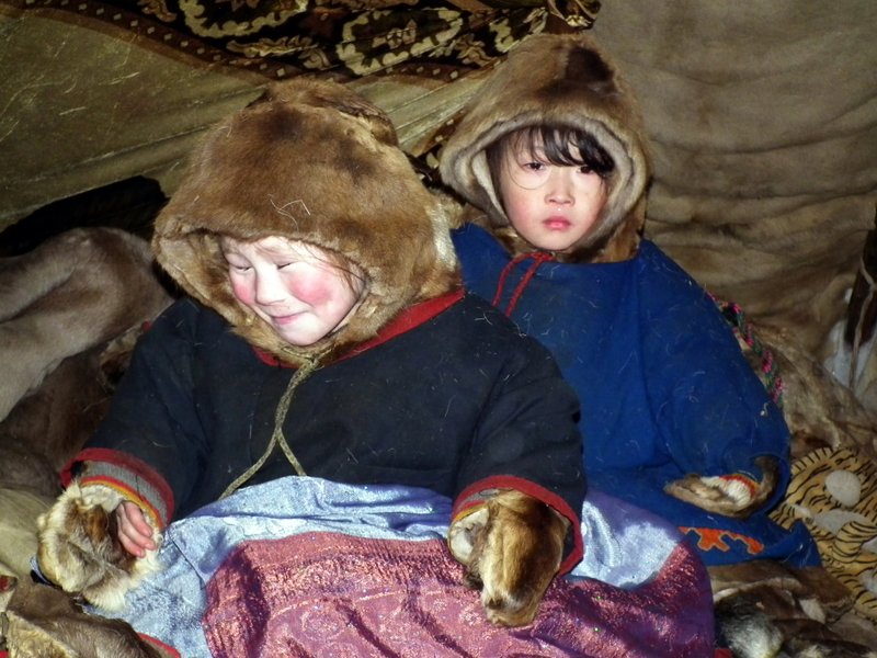Nenets children inside a chum with one of the scarves I gave them, Yamal Peninsula