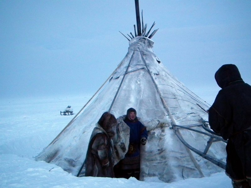 Nenets people outside chum, Yamal Peninsula