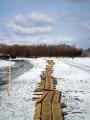 The pedestrian walkway across the frozen river on the way to Klyuchi
