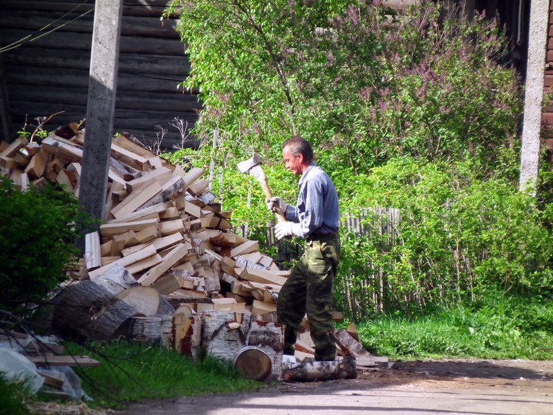 Cutting wood in Kargopol, Arkhangelskaya Oblast