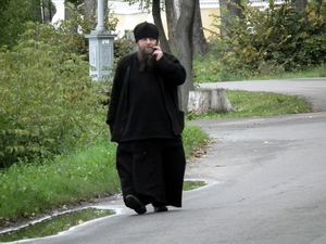 Monk near monastery, Uglich