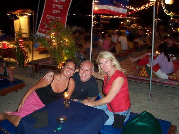 Me, mum and dad at a beach bar