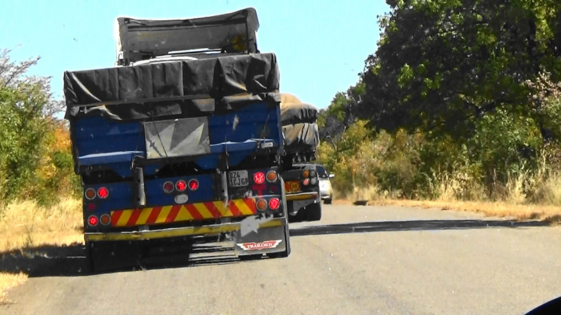 Oncoming car,passing truck...glad it wasn't us.On the way to Botswana