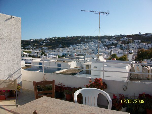 Breakfast on the terrace and the view over Mykonos