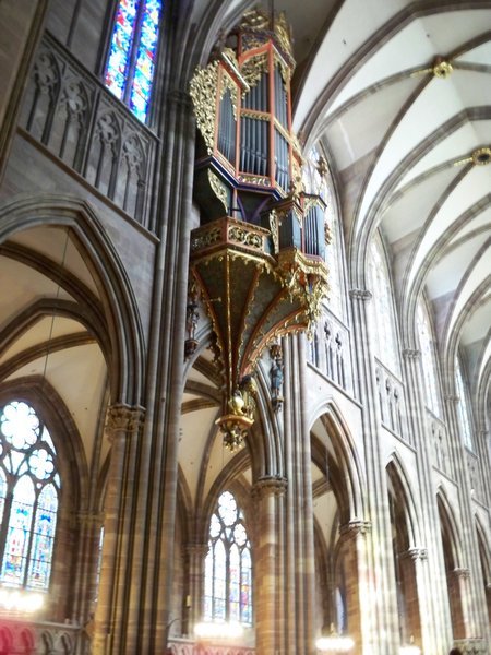 Organ mounted on column inside cathedral