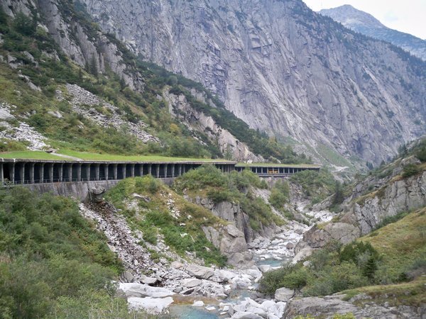The alpine river alongside the road