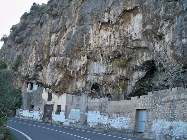 House built into the rock face,Positano