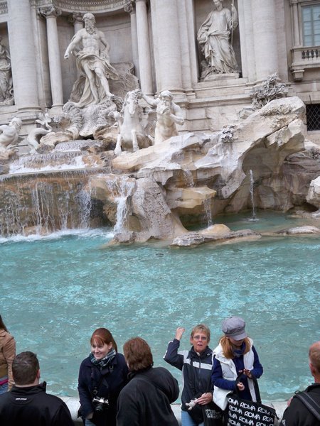 Gretchen tossing the coin at the Trevi fountain