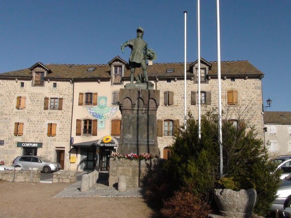Statue in square at Chateauneuf-de-Randon