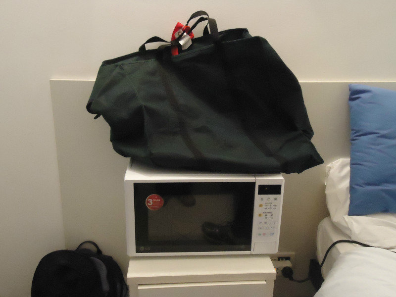 The microwave is christened and the bag it is carried in