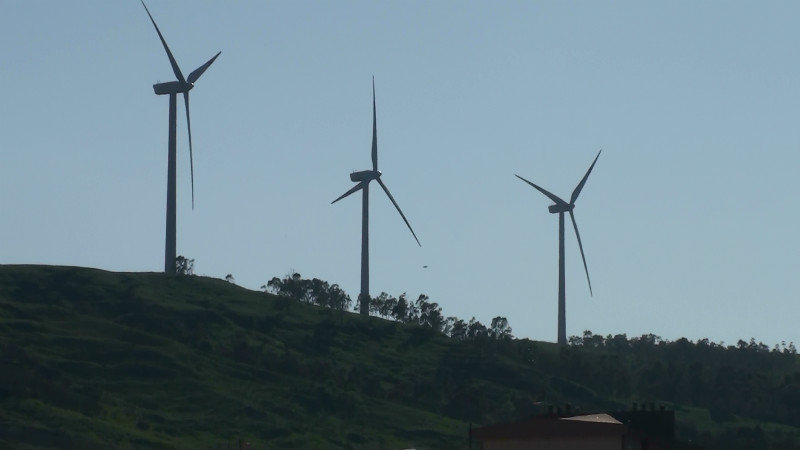 Wind turbines behind the town at Torre Melissa