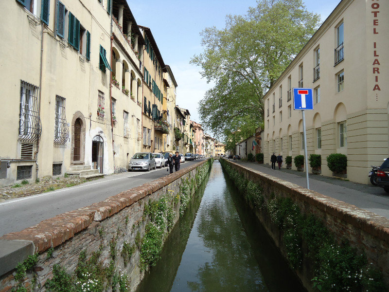 Water channel inside the old town area of Lucca