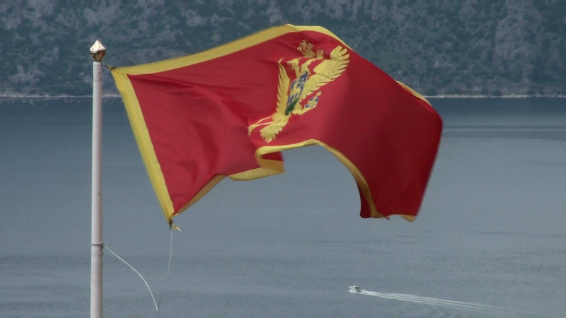 Montenegro national flag flying in the breeze