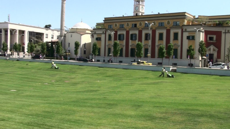 Mowing the grass Central square,Tirana