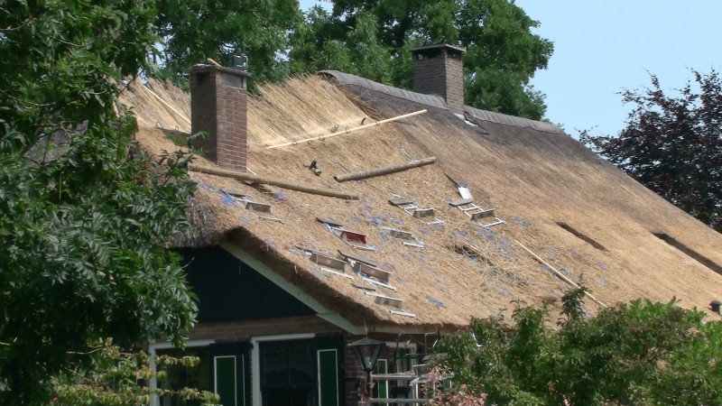 Thatched roof under repair