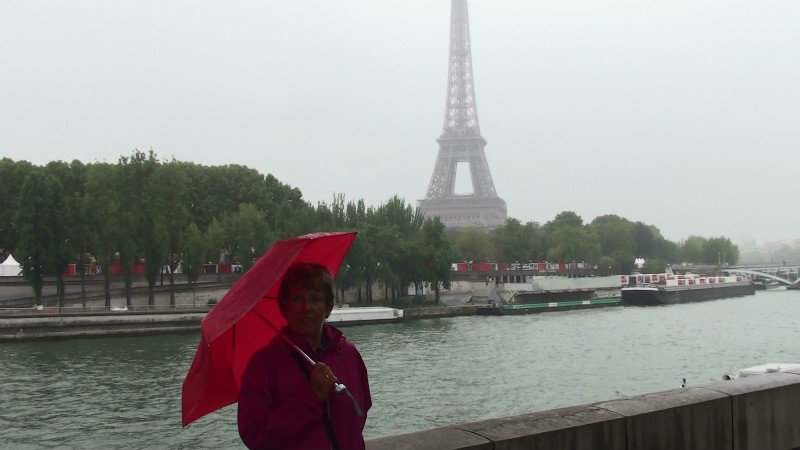 Farewell to the Eiffel Tower and Paris in the misty rain