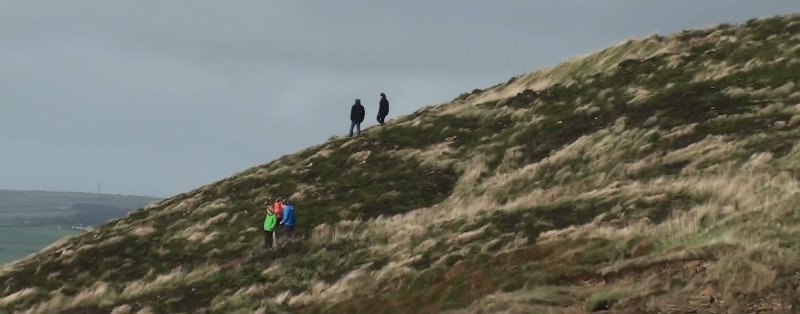 Some brave hikers on the headland